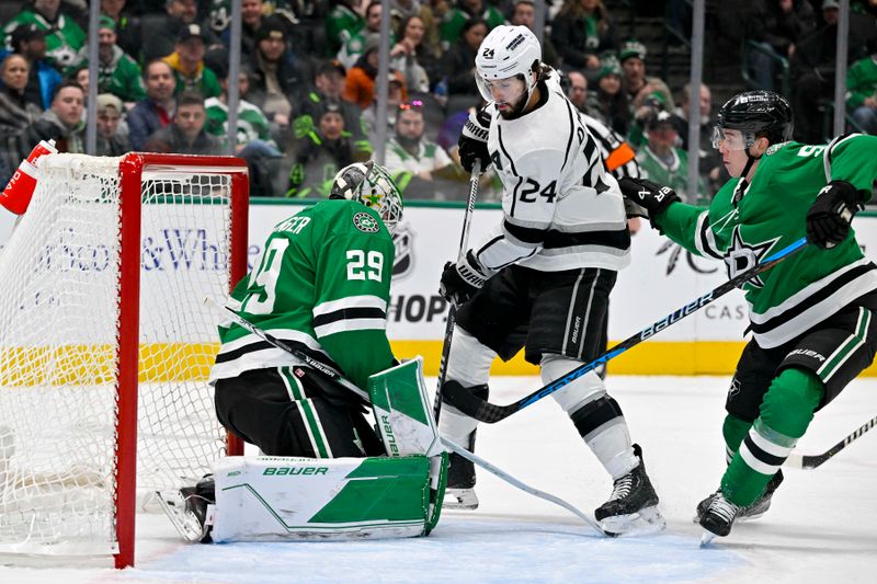 Jan 16, 2024; Dallas, Texas, USA; Dallas Stars goaltender Jake Oettinger (29) and defenseman Nils Lundkvist (5) stop a shot by Los Angeles Kings center Phillip Danault (24) during the third period at the American Airlines Center. Mandatory Credit: Jerome Miron-USA TODAY Sports