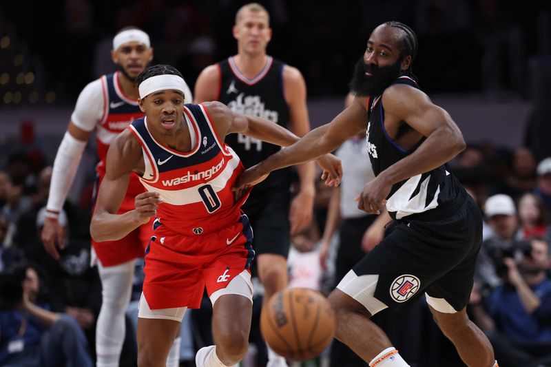 WASHINGTON, DC - JANUARY 31: Bilal Coulibaly #0 of the Washington Wizards battles James Harden #1 of the LA Clippers during first half at Capital One Arena on January 31, 2024 in Washington, DC. NOTE TO USER: User expressly acknowledges and agrees that, by downloading and or using this photograph, User is consenting to the terms and conditions of the Getty Images License Agreement. (Photo by Patrick Smith/Getty Images)