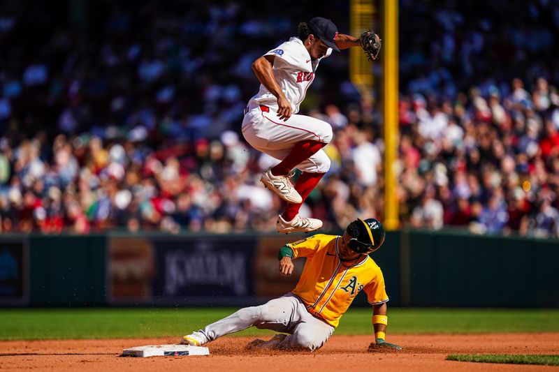 Sep 18, 2025; Boston, Massachusetts, USA; Athletics third base Darell Hernaiz (2) steals second base against Boston Red Sox second base David Hamilton (17) in the sixth inning at Fenway Park. Mandatory Credit: David Butler II-Imagn Images