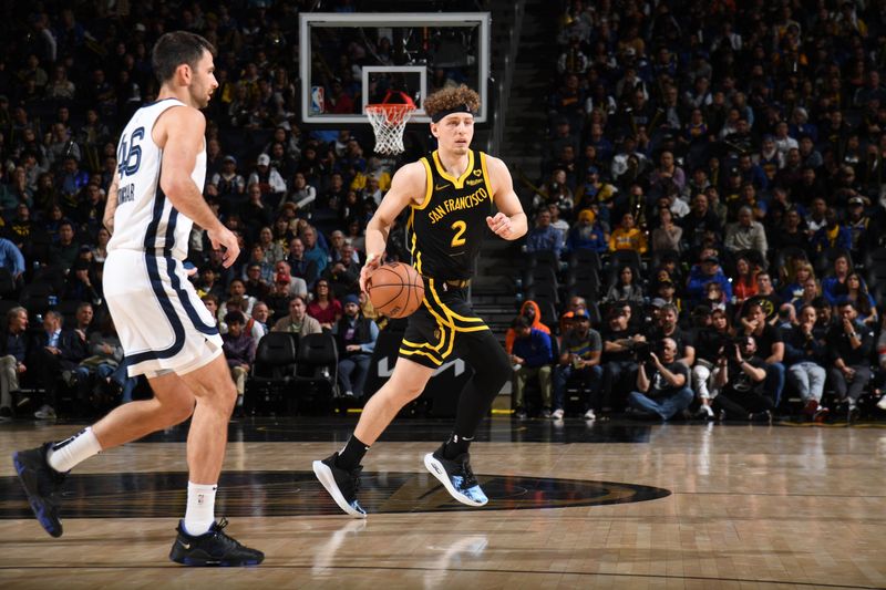 SAN FRANCISCO, CA - MARCH 20: Brandin Podziemski #2 of the Golden State Warriors dribbles the ball during the game against the Memphis Grizzlies on March 20, 2024 at Chase Center in San Francisco, California. NOTE TO USER: User expressly acknowledges and agrees that, by downloading and or using this photograph, user is consenting to the terms and conditions of Getty Images License Agreement. Mandatory Copyright Notice: Copyright 2024 NBAE (Photo by Noah Graham/NBAE via Getty Images)