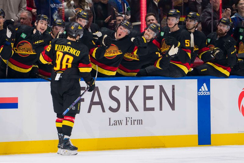 Dec 23, 2023; Vancouver, British Columbia, CAN; Vancouver Canucks forward Andrei Kuzmenko (96) celebrates his second goal of the game against the San Jose Sharks in the first period at Rogers Arena. Mandatory Credit: Bob Frid-USA TODAY Sports