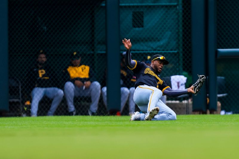 Apr 13, 2025; Cincinnati, Ohio, USA; Pittsburgh Pirates outfielder Alexander Canario (29) catches a fly out hit by Cincinnati Reds outfielder Jake Fraley (not pictured) in the second inning at Great American Ball Park. Mandatory Credit: Katie Stratman-Imagn Images