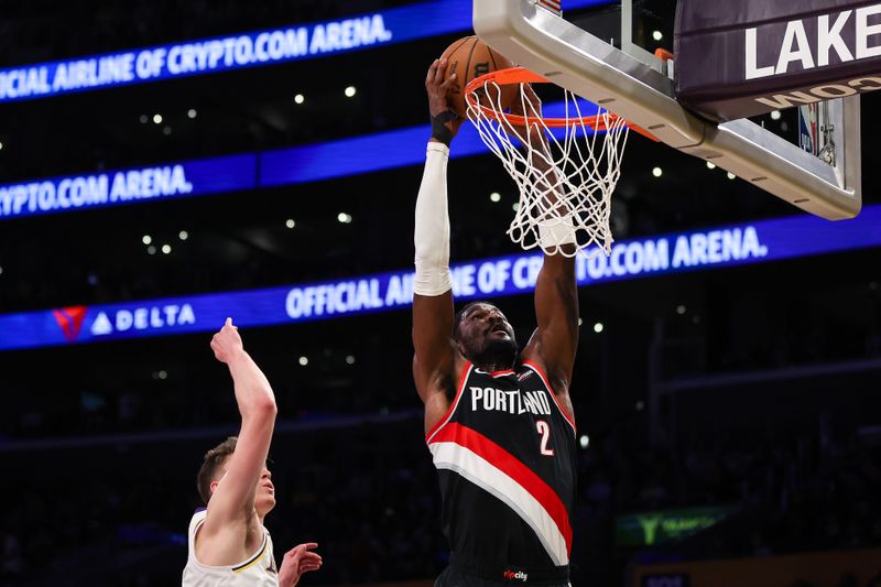 LOS ANGELES, CALIFORNIA - DECEMBER 08: Deandre Ayton #2 of the Portland Trail Blazers dunks in the first half against the Los Angeles Lakers at Crypto.com Arena on December 08, 2024 in Los Angeles, California. NOTE TO USER: User expressly acknowledges and agrees that, by downloading and or using this Photograph, user is consenting to the terms and conditions of the Getty Images License Agreement. (Photo by Meg Oliphant/Getty Images)