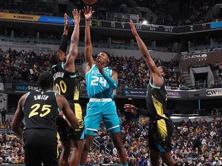 INDIANAPOLIS, IN - DECEMBER 20: Brandon Miller #24 of the Charlotte Hornets shoots the ball during the game against the Indiana Pacers on December 20, 2023 at Gainbridge Fieldhouse in Indianapolis, Indiana. NOTE TO USER: User expressly acknowledges and agrees that, by downloading and or using this Photograph, user is consenting to the terms and conditions of the Getty Images License Agreement. Mandatory Copyright Notice: Copyright 2023 NBAE (Photo by Ron Hoskins/NBAE via Getty Images)