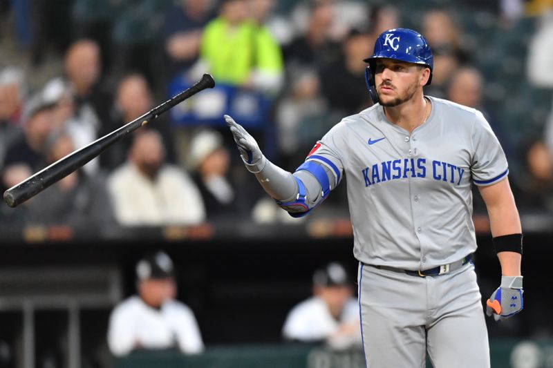 Apr 15, 2024; Chicago, Illinois, USA; Kansas City Royals first baseman Vinnie Pasquantino (9) flips his bat after hitting a home run during the fourth inning against the Chicago White Sox at Guaranteed Rate Field. Mandatory Credit: Patrick Gorski-USA TODAY Sports