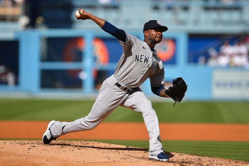 Jun 4, 2023; Los Angeles, California, USA; New York Yankees starting pitcher Domingo German (0) throws against the Los Angeles Dodgers during the second inning at Dodger Stadium. Mandatory Credit: Gary A. Vasquez-USA TODAY Sports