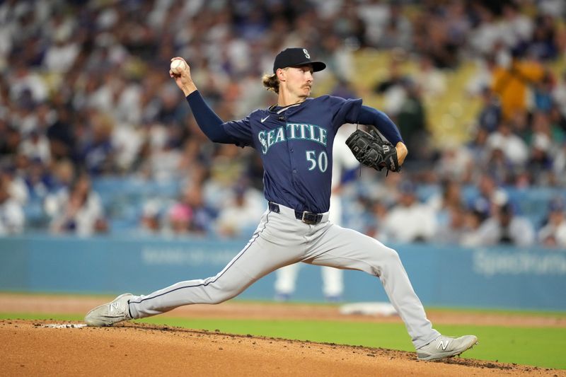 Aug 20, 2024; Los Angeles, California, USA; Los Angeles Dodgers starting pitcher Walker Buehler (21) throws in the second inning against the Seattle Mariners at Dodger Stadium. Mandatory Credit: Kirby Lee-USA TODAY Sports