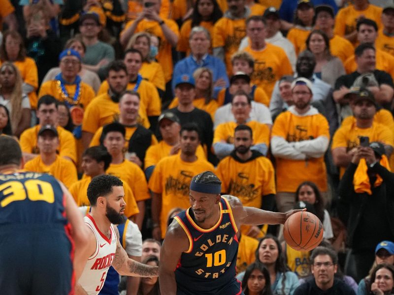 SAN FRANCISCO, CA - APRIL 28: Jimmy Butler #10 of the Golden State Warriors handles the ball during the game against the Houston Rockets during Round 1 Game 4 of the 2025 NBA Playoffs on February 1, 2025 at Chase Center in San Francisco, California. NOTE TO USER: User expressly acknowledges and agrees that, by downloading and or using this photograph, user is consenting to the terms and conditions of Getty Images License Agreement. Mandatory Copyright Notice: Copyright 2025 NBAE (Photo by Jesse D. Garrabrant/NBAE via Getty Images)