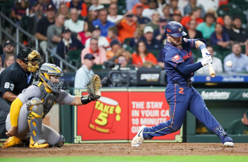 May 13, 2024; Houston, Texas, USA; Houston Astros third baseman Alex Bregman (2) hits a home run against the Oakland Athletics in the seventh inning at Minute Maid Park. Mandatory Credit: Thomas Shea-USA TODAY Sports