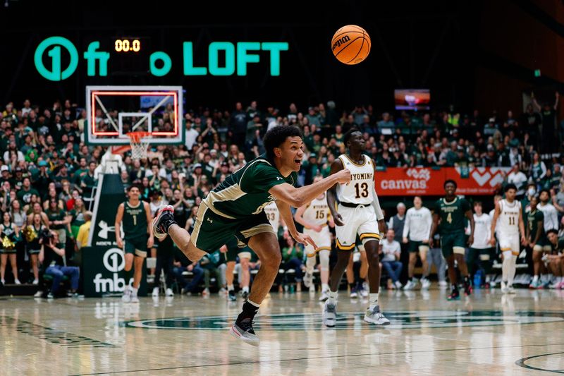 Mar 2, 2024; Fort Collins, Colorado, USA; Colorado State Rams guard Jalen Lake (15) attempts to get off a shot before the buzzer in the first half against the Wyoming Cowboys at Moby Arena. Mandatory Credit: Isaiah J. Downing-USA TODAY Sports