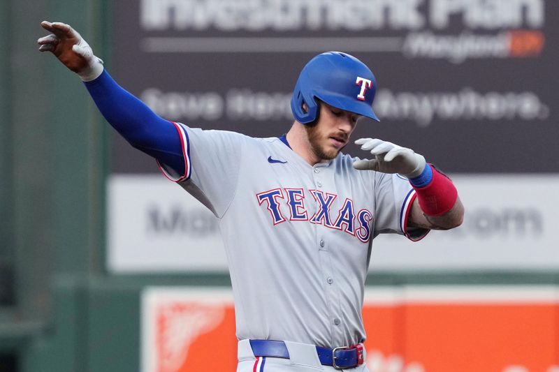 Jun 25, 2025; Baltimore, Maryland, USA; Texas Rangers catcher Jonah Heim (28) gestures following his fourth inning double against the Baltimore Orioles at Oriole Park at Camden Yards. Mandatory Credit: Mitch Stringer-Imagn Images