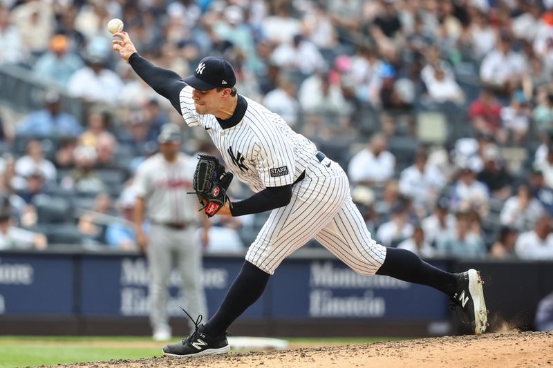 Jun 23, 2024; Bronx, New York, USA;  New York Yankees pitcher Tommy Kahnle (41) pitches in the eighth inning against the Atlanta Braves at Yankee Stadium. Mandatory Credit: Wendell Cruz-USA TODAY Sports