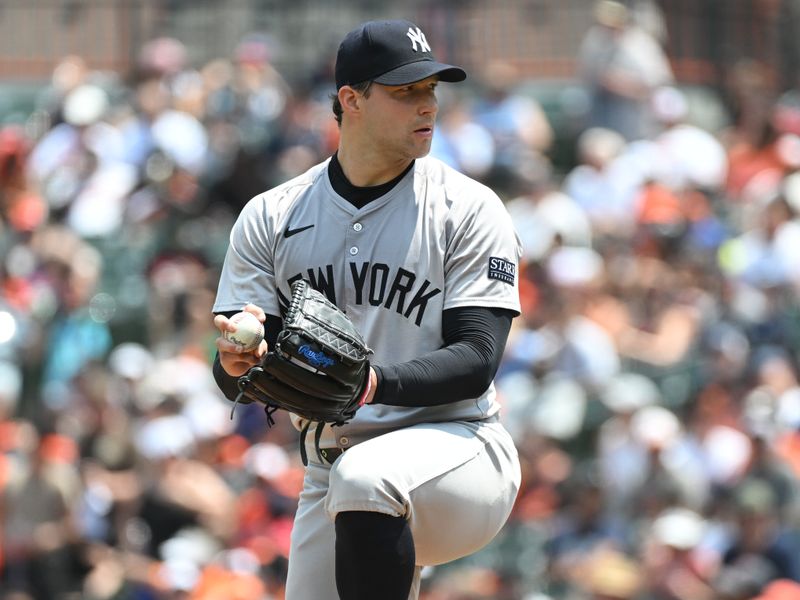 Jul 14, 2024; Baltimore, Maryland, USA;  New York Yankees pitcher Tommy Kahnle (41) delivers a sixth inning pitch against the Baltimore Orioles at Oriole Park at Camden Yards. Mandatory Credit: James A. Pittman-USA TODAY Sports