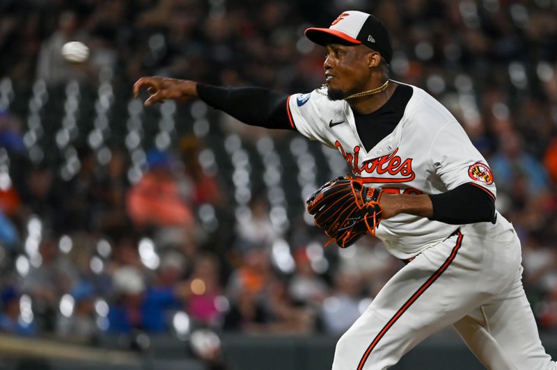 Jul 30, 2024; Baltimore, Maryland, USA; Baltimore Orioles pitcher Yennier Cano (78) throws a eighth inning pitch against the Toronto Blue Jays  at Oriole Park at Camden Yards. Mandatory Credit: Tommy Gilligan-USA TODAY Sports