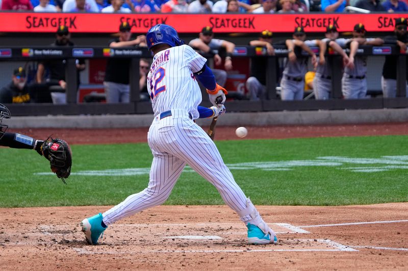 Aug 16, 2023; New York City, New York, USA; New York Mets shortstop Francisco Lindor (12) hits an RBI double against the Pittsburgh Pirates during the second inning at Citi Field. Mandatory Credit: Gregory Fisher-USA TODAY Sports