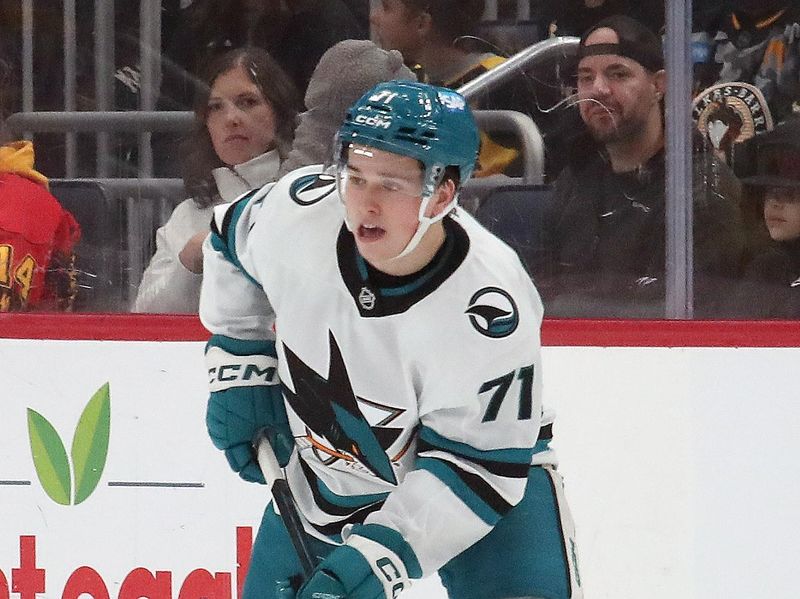 Nov 16, 2024; Pittsburgh, Pennsylvania, USA;  San Jose Sharks center Macklin Celebrini (71) skates with the puck against the Pittsburgh Penguins during the first period at PPG Paints Arena. Mandatory Credit: Charles LeClaire-Imagn Images