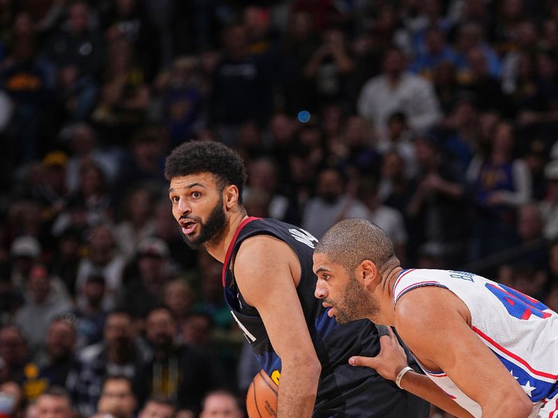 DENVER, CO - JANUARY 27: Jamal Murray #27 of the Denver Nuggets looks on during the game against the Philadelphia 76ers on January 27, 2024 at the Ball Arena in Denver, Colorado. NOTE TO USER: User expressly acknowledges and agrees that, by downloading and/or using this Photograph, user is consenting to the terms and conditions of the Getty Images License Agreement. Mandatory Copyright Notice: Copyright 2024 NBAE (Photo by Bart Young/NBAE via Getty Images)