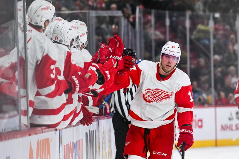 Dec 2, 2023; Montreal, Quebec, CAN; Detroit Red Wings right wing Daniel Sprong (17) celebrates his goal against the Montreal Canadiens with his teammates at the bench during the first period at Bell Centre. Mandatory Credit: David Kirouac-USA TODAY Sports