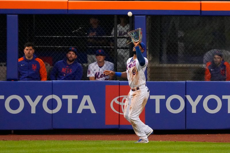 Jul 16, 2023; New York City, New York, USA; New York Mets right fielder Starling Marte (6) catches a fly ball hit by Los Angeles Dodgers catcher Will Smith (not pictured) during the eighth inning at Citi Field. Mandatory Credit: Gregory Fisher-USA TODAY Sports