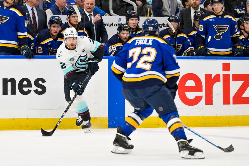 Feb 25, 2025; St. Louis, Missouri, USA;  Seattle Kraken right wing Oliver Bjorkstrand (22) controls the puck against the St. Louis Blues during the first period at Enterprise Center. Mandatory Credit: Jeff Curry-Imagn Images