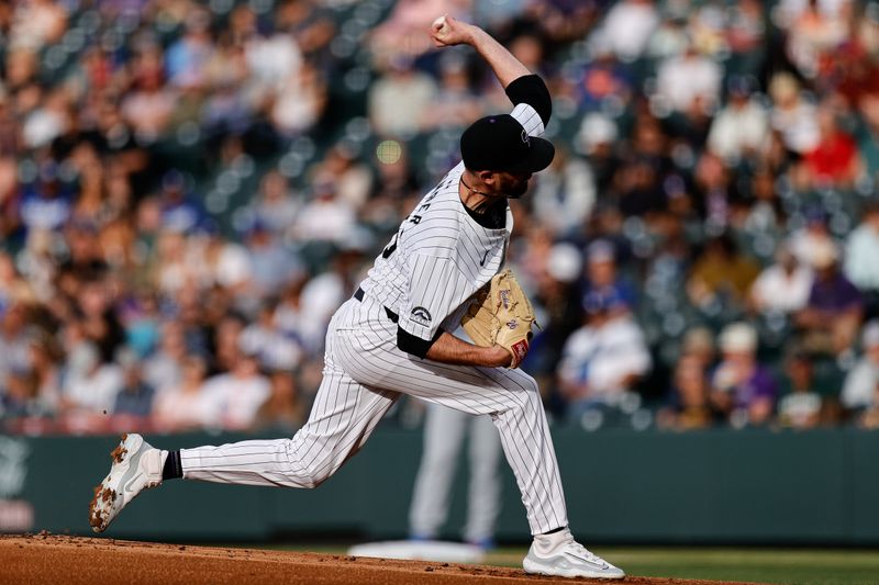 Jun 18, 2024; Denver, Colorado, USA; Colorado Rockies starting pitcher Austin Gomber (26) pitches in the first inning against the Los Angeles Dodgers at Coors Field. Mandatory Credit: Isaiah J. Downing-USA TODAY Sports