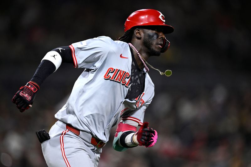 Apr 30, 2024; San Diego, California, USA; Cincinnati Reds shortstop Elly De La Cruz (44) runs to first base after hitting a single against the San Diego Padres during the fifth inning at Petco Park. Mandatory Credit: Orlando Ramirez-USA TODAY Sports