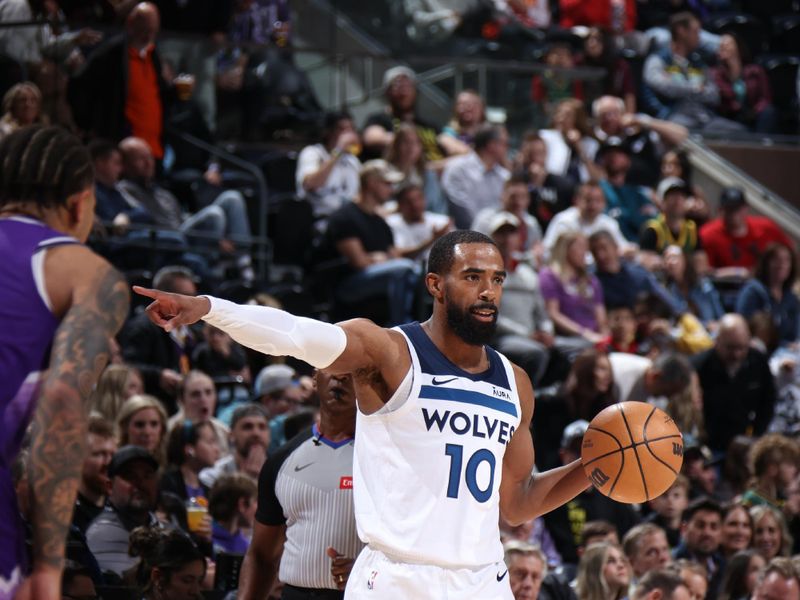 SALT LAKE CITY, UT - MARCH 18: Mike Conley #10 of the Minnesota Timberwolves handles the ball during the game against the Utah Jazz on March 18, 2024 at Delta Center in Salt Lake City, Utah. NOTE TO USER: User expressly acknowledges and agrees that, by downloading and or using this Photograph, User is consenting to the terms and conditions of the Getty Images License Agreement. Mandatory Copyright Notice: Copyright 2024 NBAE (Photo by Melissa Majchrzak/NBAE via Getty Images)