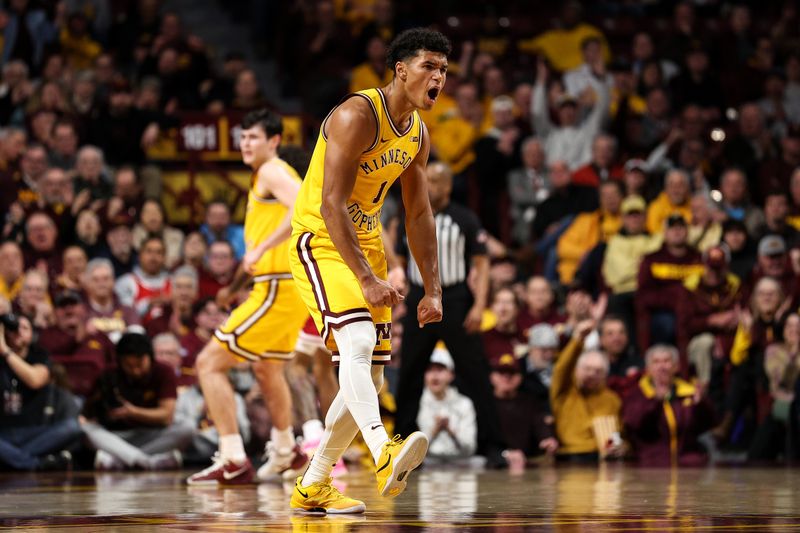 Dec 3, 2025; Minneapolis, Minnesota, USA; Minnesota Golden Gophers guard Isaac Asuma (1) celebrates his three point basket against the Indiana Hoosiers during the second half at Williams Arena. Mandatory Credit: Matt Krohn-Imagn Images