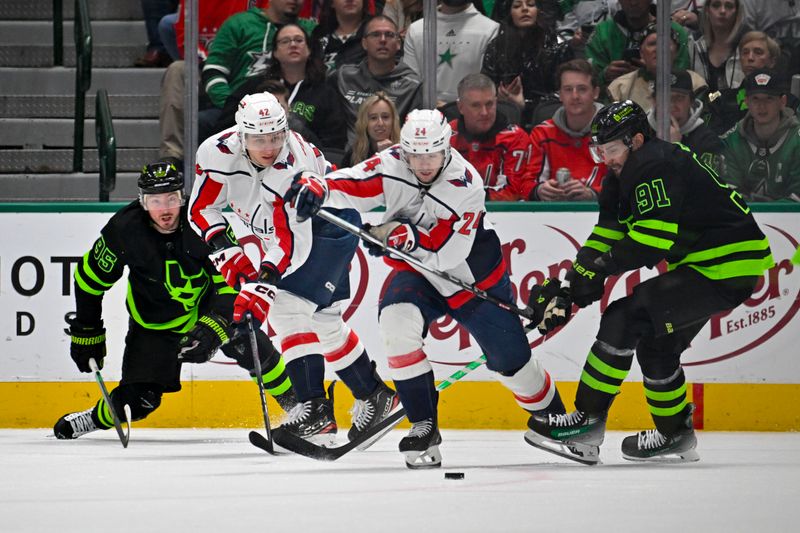 Jan 27, 2024; Dallas, Texas, USA; Dallas Stars center Matt Duchene (95) and center Tyler Seguin (91) and Washington Capitals defenseman Martin Fehervary (42) and center Connor McMichael (24) chase the puck during the first period at the American Airlines Center. Mandatory Credit: Jerome Miron-USA TODAY Sports