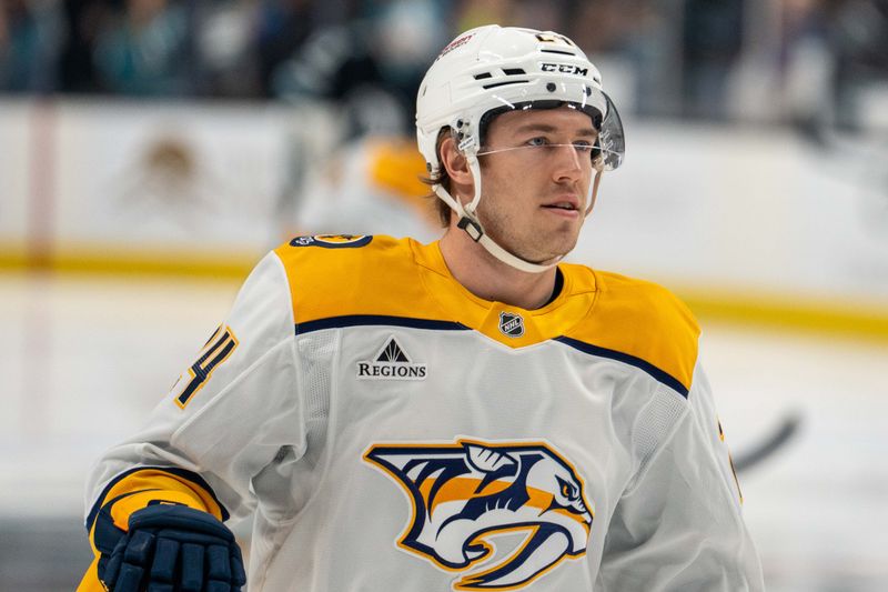 Jan 23, 2025; San Jose, California, USA;  Nashville Predators defenseman Spencer Stastney (24) before the start of the game against the San Jose Sharks at SAP Center at San Jose. Mandatory Credit: Neville E. Guard-Imagn Images