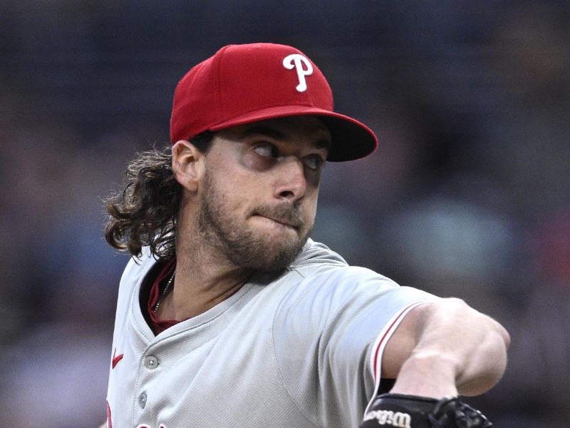 Apr 26, 2024; San Diego, California, USA; Philadelphia Phillies starting pitcher Aaron Nola (27) throws a pitch during the first inning against the San Diego Padres at Petco Park. Mandatory Credit: Orlando Ramirez-USA TODAY Sports