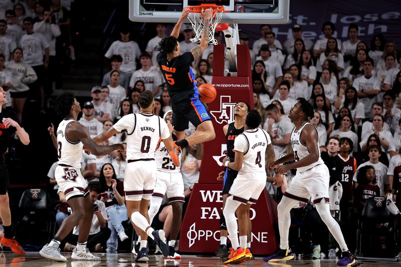 Jan 18, 2023; College Station, Texas, USA; Florida Gators guard Will Richard (5) makes a slam dunk against the Texas A&M Aggies during the second half at Reed Arena. Mandatory Credit: Erik Williams-USA TODAY Sports
