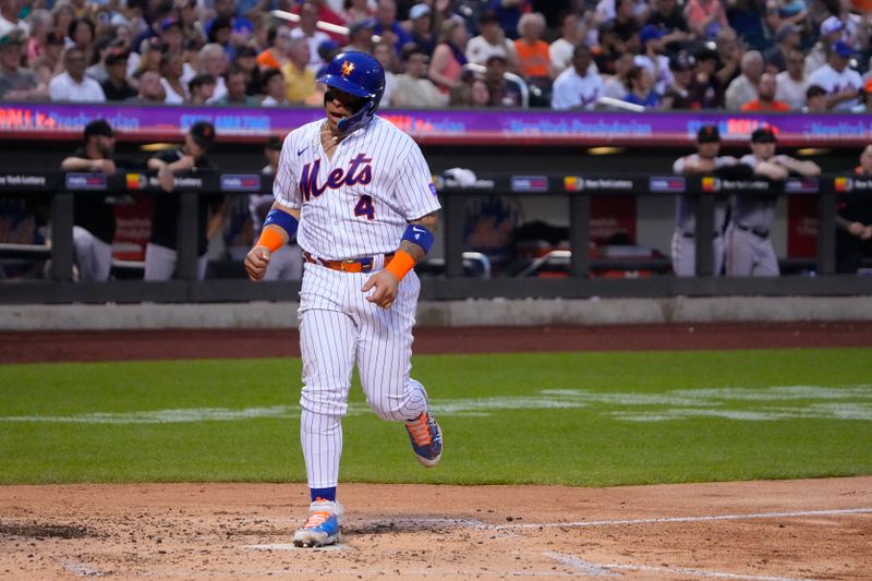 Jul 2, 2023; New York City, New York, USA; New York Mets catcher Francisco Alvarez (4) scores a run on a bases loaded walk to New York Mets designated hitter Pete Alonso (not pictured) against the San Francisco Gianes during the third inning at Citi Field. Mandatory Credit: Gregory Fisher-USA TODAY Sports