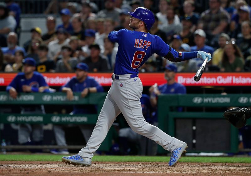 Aug 25, 2023; Pittsburgh, Pennsylvania, USA; Chicago Cubs left fielder Ian Happ (8) hits a solo home run against the Pittsburgh Pirates during the ninth inning at PNC Park. Pittsburgh won 2-1. Mandatory Credit: Charles LeClaire-USA TODAY Sports