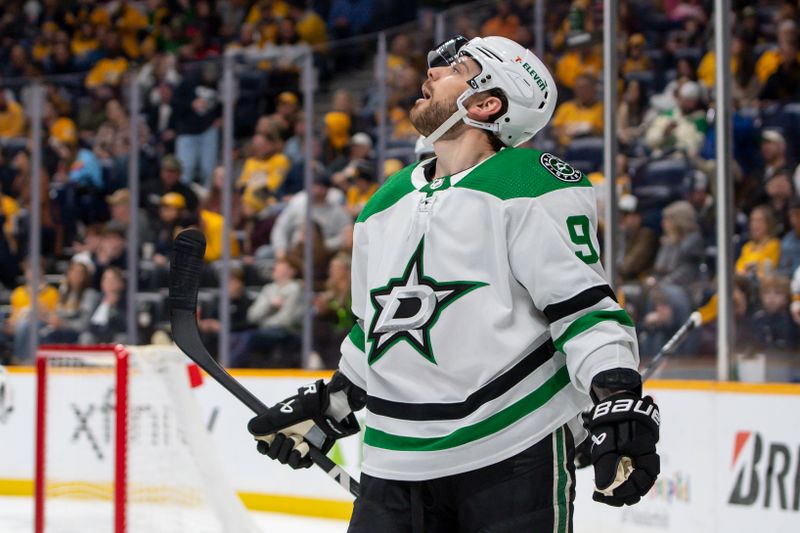 Feb 15, 2024; Nashville, Tennessee, USA; Dallas Stars center Tyler Seguin (91) celebrates his goal against the Nashville Predators during the second period at Bridgestone Arena. Mandatory Credit: Steve Roberts-USA TODAY Sports