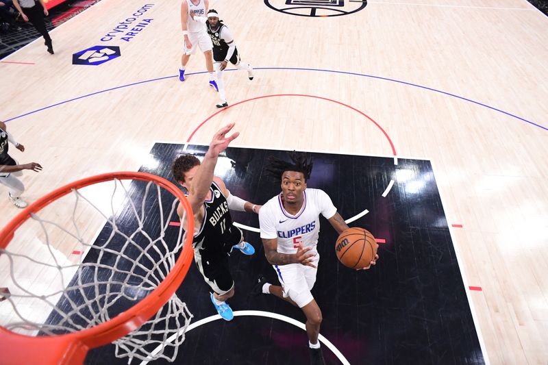 LOS ANGELES, CA - MARCH 10: Bones Hyland #5 of the LA Clippers shoots the ball during the game against the Milwaukee Bucks  on March 10, 2024 at Crypto.Com Arena in Los Angeles, California. NOTE TO USER: User expressly acknowledges and agrees that, by downloading and/or using this Photograph, user is consenting to the terms and conditions of the Getty Images License Agreement. Mandatory Copyright Notice: Copyright 2024 NBAE (Photo by Adam Pantozzi/NBAE via Getty Images)