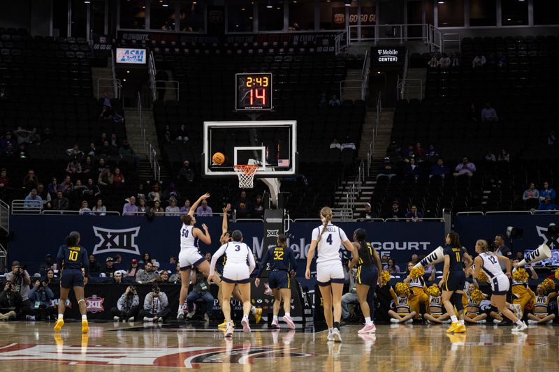 Mar 9, 2024; Kansas City, MO, USA; Kansas State Wildcats center Ayoka Lee (50) shoots the ball against the West Virginia Mountaineers during the first half at T-Mobile Center. Mandatory Credit: Amy Kontras-USA TODAY Sports