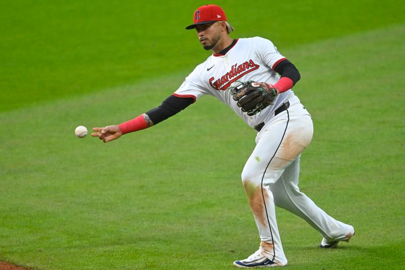 Apr 28, 2025; Cleveland, Ohio, USA; Cleveland Guardians second baseman Gabriel Arias (13) throws to first base in the fifth inning against the Minnesota Twins at Progressive Field. Mandatory Credit: David Richard-Imagn Images