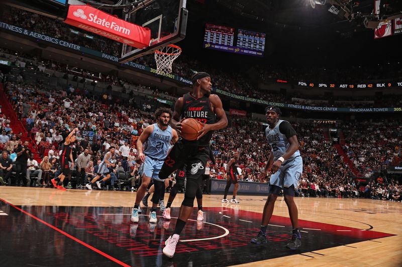 MIAMI, FL - JANUARY 24:  Jimmy Butler #22 of the Miami Heat grabs a rebound during the game against the Memphis Grizzlies on January 24, 2024 at Kaseya Center in Miami, Florida. NOTE TO USER: User expressly acknowledges and agrees that, by downloading and or using this Photograph, user is consenting to the terms and conditions of the Getty Images License Agreement. Mandatory Copyright Notice: Copyright 2024 NBAE (Photo by Issac Baldizon/NBAE via Getty Images)