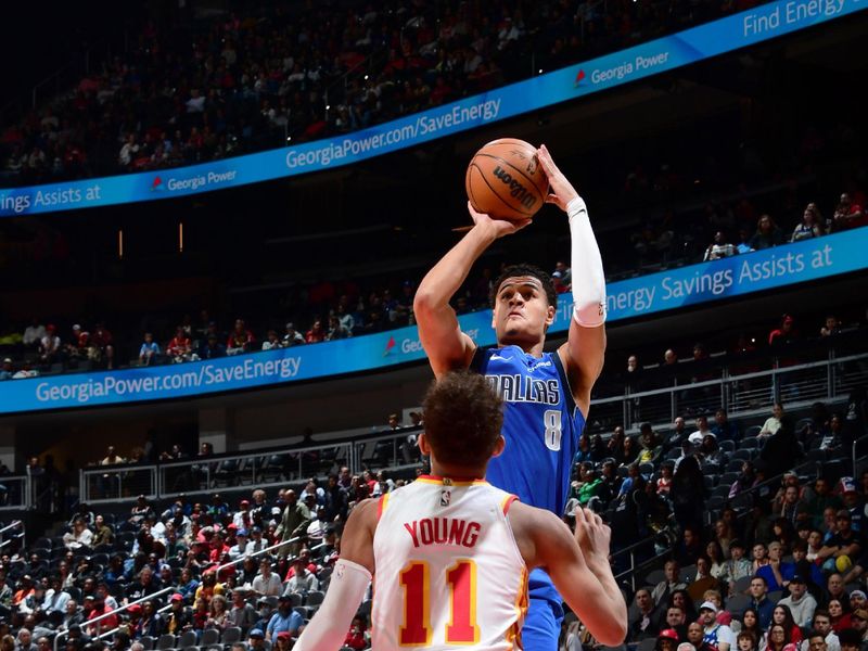 ATLANTA, GA - JANUARY 26: Josh Green #8 of the Dallas Mavericks shoots the ball during the game against the Atlanta Hawks on January 26, 2024 at State Farm Arena in Atlanta, Georgia.  NOTE TO USER: User expressly acknowledges and agrees that, by downloading and/or using this Photograph, user is consenting to the terms and conditions of the Getty Images License Agreement. Mandatory Copyright Notice: Copyright 2024 NBAE (Photo by Scott Cunningham/NBAE via Getty Images)