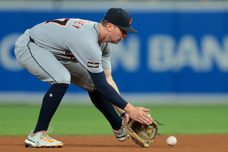 Sep 12, 2025; Miami, Florida, USA; Detroit Tigers shortstop Trey Sweeney (27) catches a ground ball against Miami Marlins shortstop Otto Lopez (not pictured) during the fifth inning at loanDepot Park. Mandatory Credit: Sam Navarro-Imagn Images