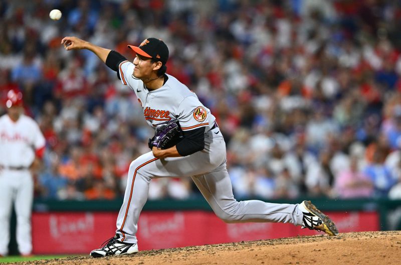 Jul 25, 2023; Philadelphia, Pennsylvania, USA; Baltimore Orioles relief pitcher Shintaro Fujinami (14) throws a pitch against the Philadelphia Phillies in the seventh inning at Citizens Bank Park. Mandatory Credit: Kyle Ross-USA TODAY Sports