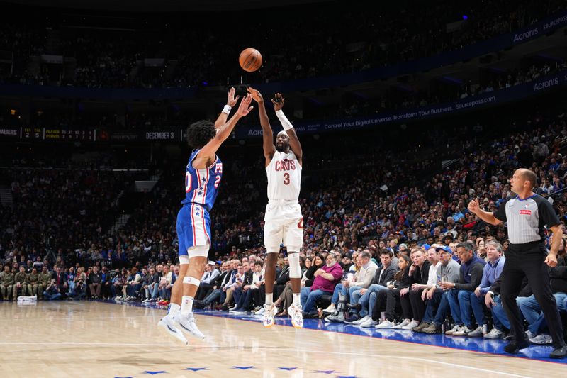 PHILADELPHIA, PA - NOVEMBER 13: Caris LeVert #3 of the Cleveland Cavaliers shoots a three point basket during the game against the Philadelphia 76ers on November 13, 2024 at the Wells Fargo Center in Philadelphia, Pennsylvania NOTE TO USER: User expressly acknowledges and agrees that, by downloading and/or using this Photograph, user is consenting to the terms and conditions of the Getty Images License Agreement. Mandatory Copyright Notice: Copyright 2024 NBAE (Photo by Jesse D. Garrabrant/NBAE via Getty Images)