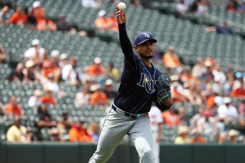 Jun 29, 2025; Baltimore, Maryland, USA; Tampa Bay Rays pitcher Taj Bradley (45) throws to first during the fifth inning against the Baltimore Orioles at Oriole Park at Camden Yards. Mandatory Credit: Daniel Kucin Jr.-Imagn Images