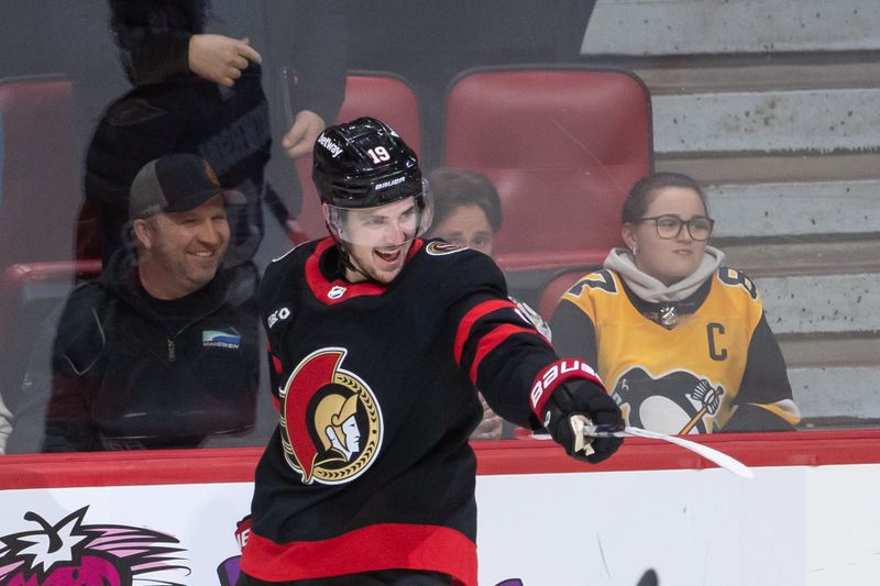 Mar 12, 2024; Ottawa, Ontario, CAN; Ottawa Senators right wing Drake Batherson (19) celebrate his goal scored in overtime against the Pittsburgh Penguins at  the Canadian Tire Centre. Mandatory Credit: Marc DesRosiers-USA TODAY Sports