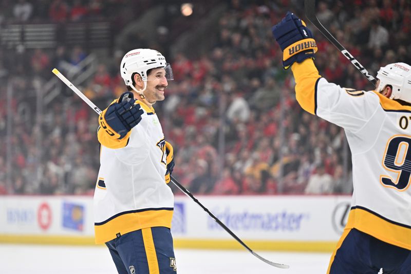 Apr 12, 2024; Chicago, Illinois, USA; Nashville Predators forward Filip Forsberg (9) celebrates after scoring a power play goal in the first period against the Chicago Blackhawks at United Center. Mandatory Credit: Jamie Sabau-USA TODAY Sports