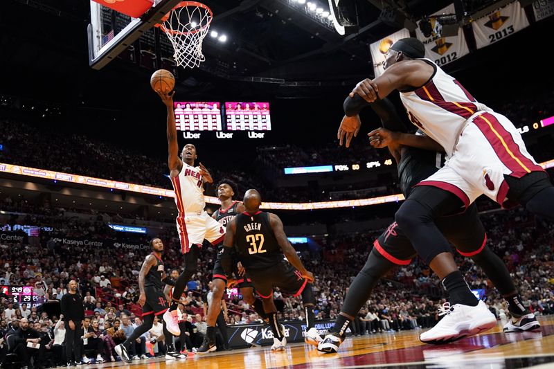 MIAMI, FLORIDA - JANUARY 08: Jeff Green #32 of the Houston Rockets is fouled by Josh Richardson #0 of the Miami Heat during the second quarter at Kaseya Center on January 08, 2024 in Miami, Florida. NOTE TO USER: User expressly acknowledges and agrees that, by downloading and or using this photograph, User is consenting to the terms and conditions of the Getty Images License Agreement. (Photo by Rich Storry/Getty Images)