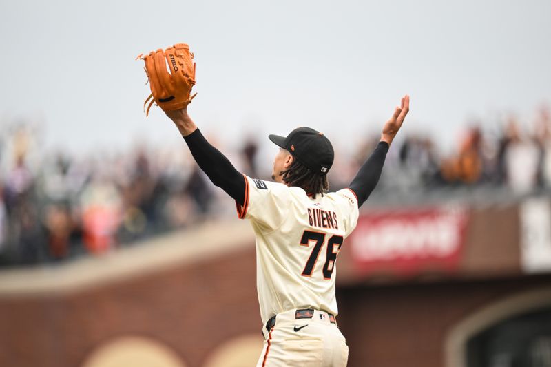 Sep 28, 2025; San Francisco, California, USA;  San Francisco Giants pitcher Spencer Bivens (76) celebrates the game winning strike out against the Colorado Rockies in the ninth inning at Oracle Park. Mandatory Credit: Eakin Howard-Imagn Images