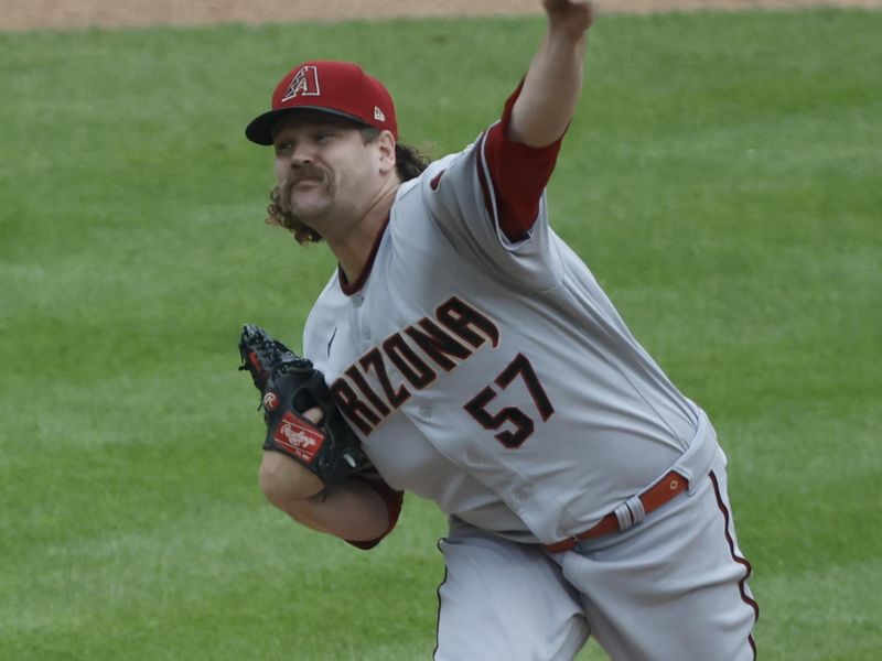 Jun 11, 2023; Detroit, Michigan, USA;  Arizona Diamondbacks relief pitcher Andrew Chafin (57) pitches in the ninth inning against the Detroit Tigers at Comerica Park. Mandatory Credit: Rick Osentoski-USA TODAY Sports