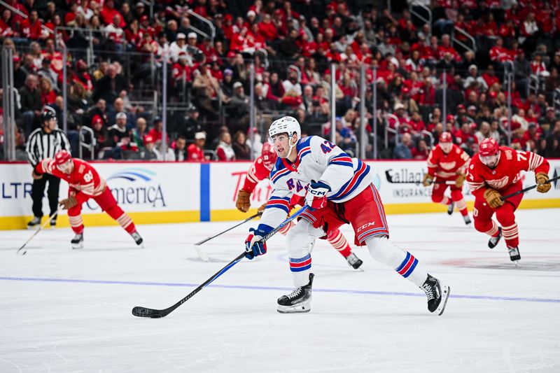 Nov 7, 2025; Detroit, Michigan, USA; New York Rangers center Noah Laba (42) brings the puck up ice during the first period against the Detroit Red Wings at Little Caesars Arena. Mandatory Credit: Tim Fuller-Imagn Images
